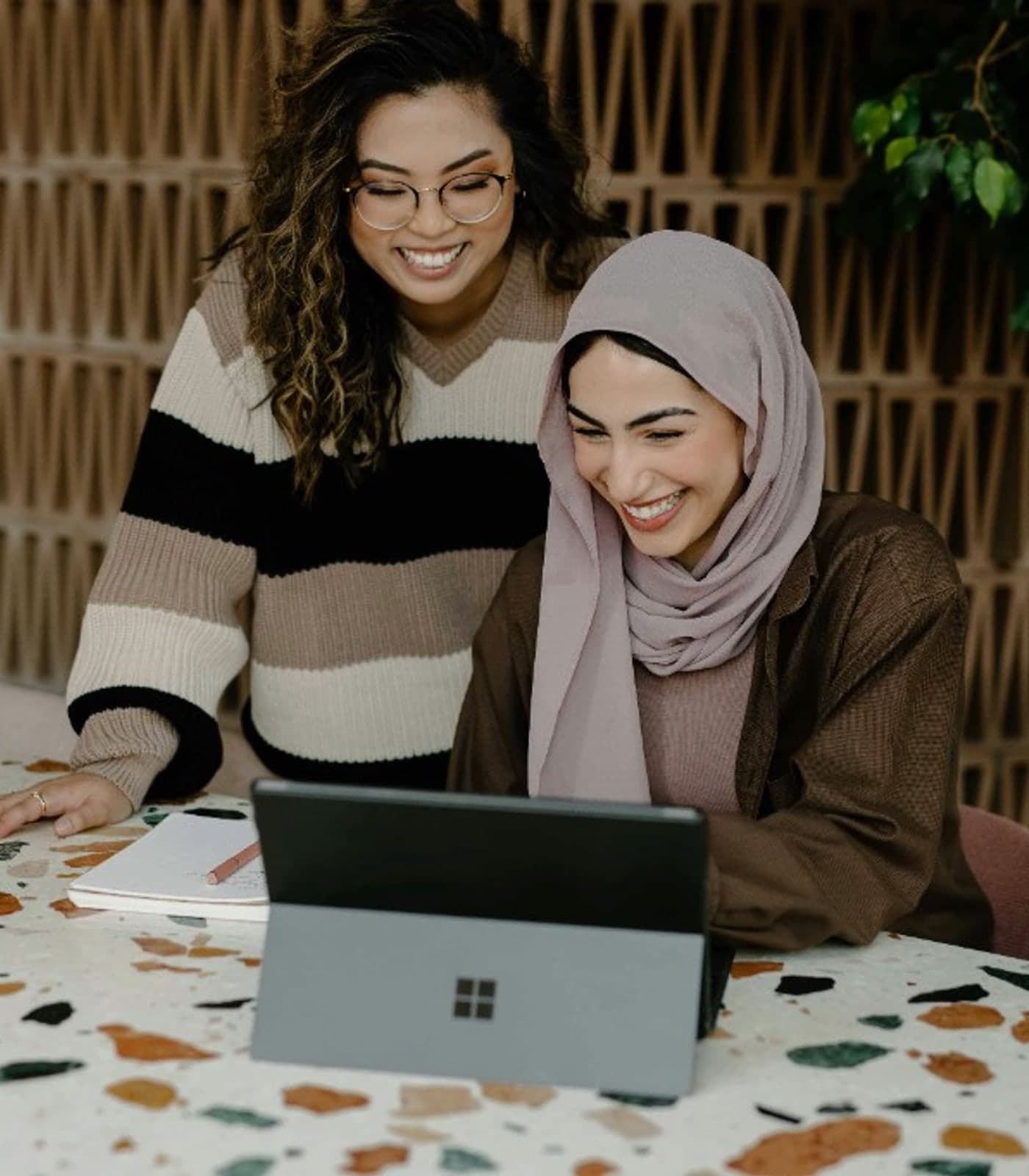 Professionals collaborating on customer experience work